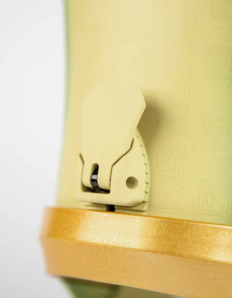 Nitro one x drink sexy snowboard bindings in yellow green and gold faded pattern.