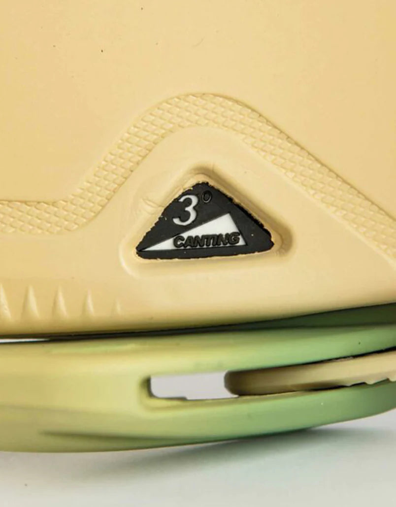 Nitro one x drink sexy snowboard bindings in yellow green and gold faded pattern.