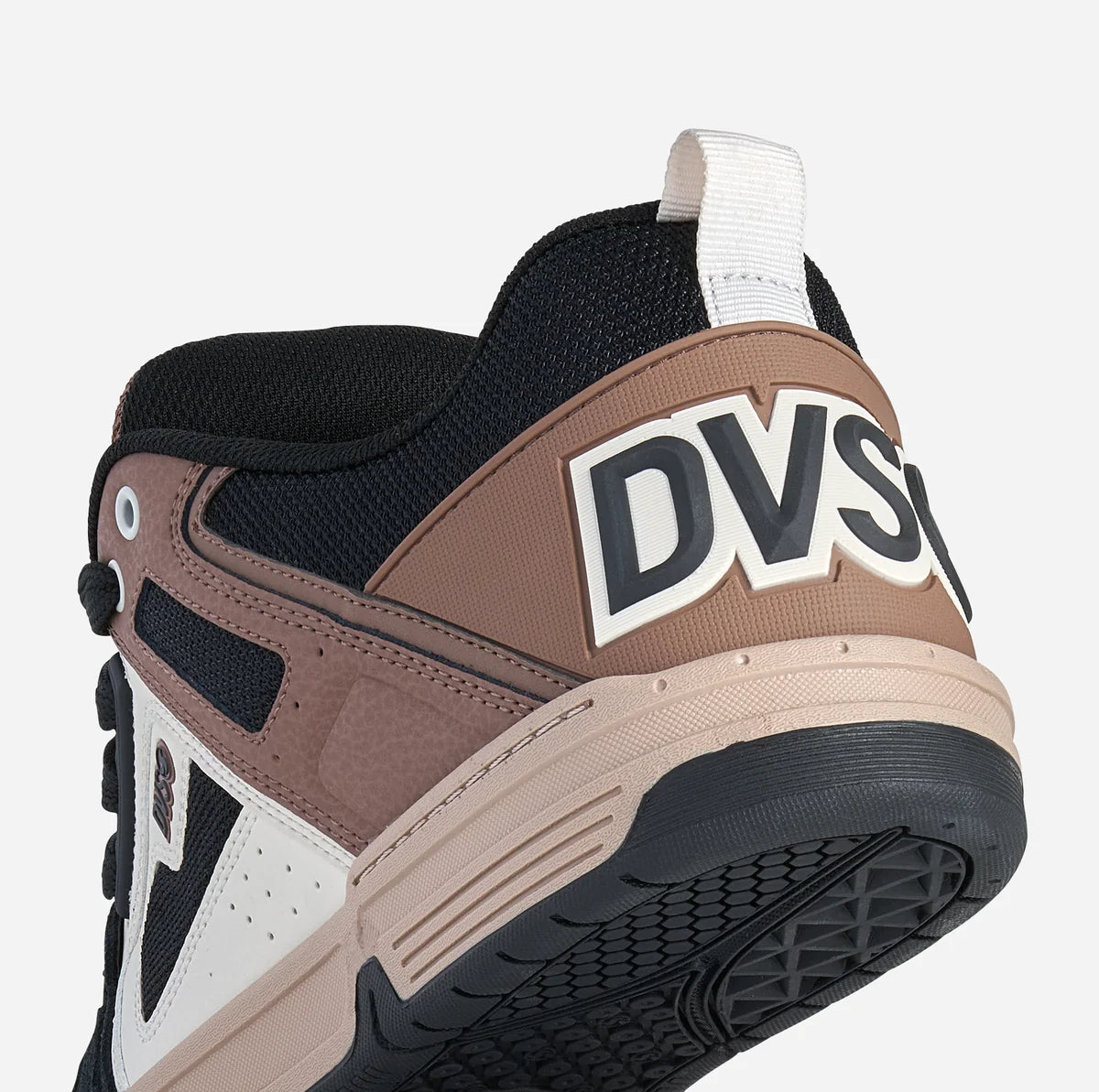Brown and black sneaker with 'DV8' branding on a white background