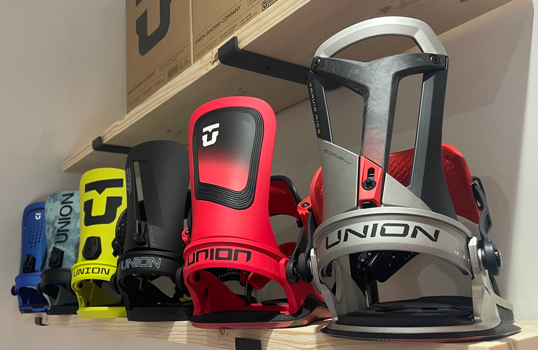 union snowboard bindings lined up in a range of colours