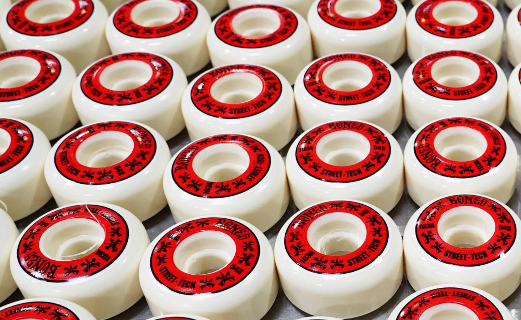 bones x forumla skateboard wheels with red graphics