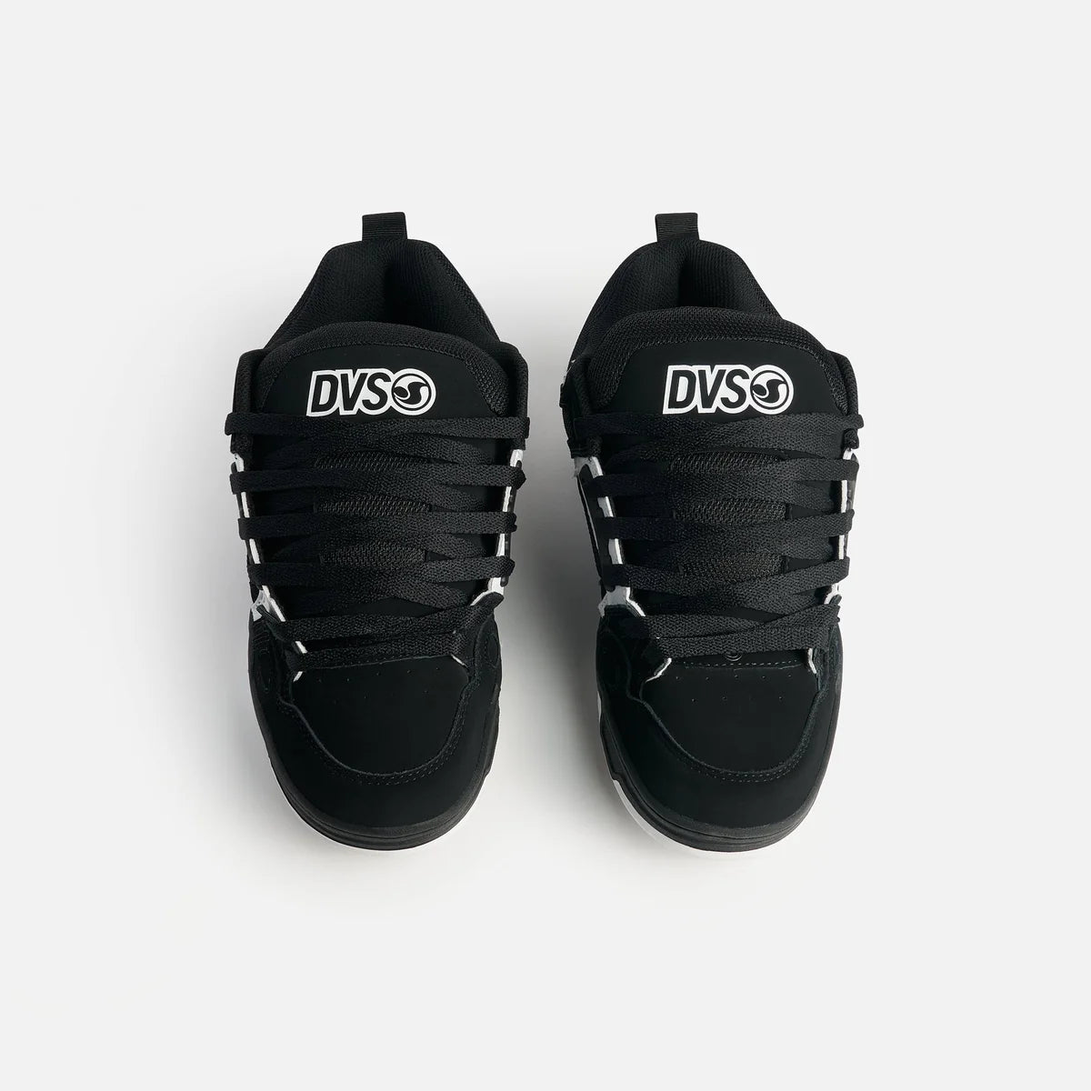 Black sneakers with DVS logo on a white background