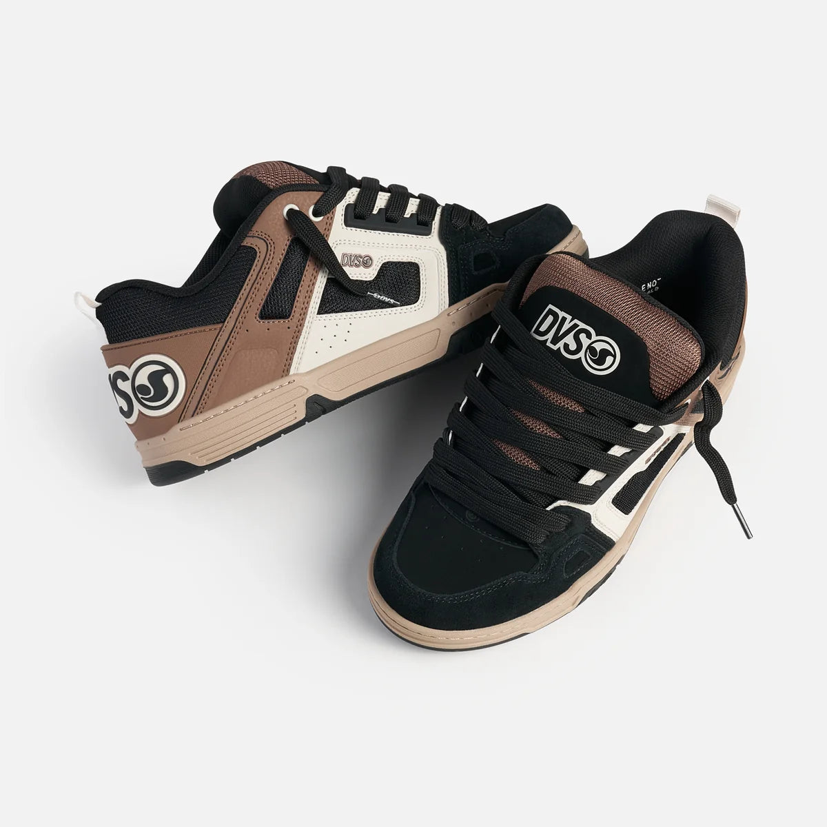 Pair of black and brown sneakers with visible DVS logo on a white background