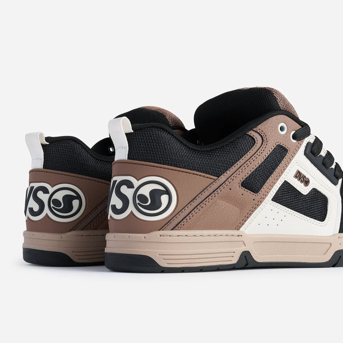 Brown and beige sneakers with a logo on a white background