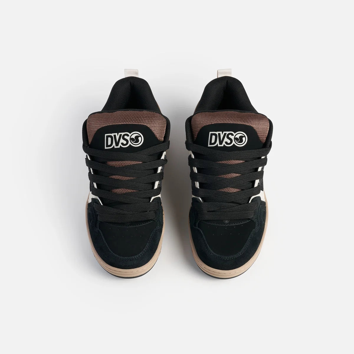 Black sneakers with brown accents on a white background
