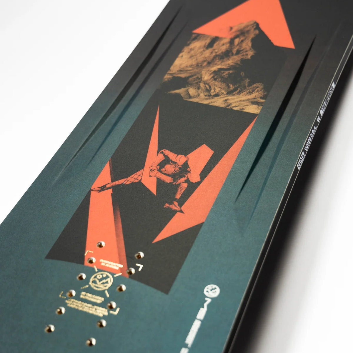 Close-up of a skateboard deck with graphic design and text on a white background